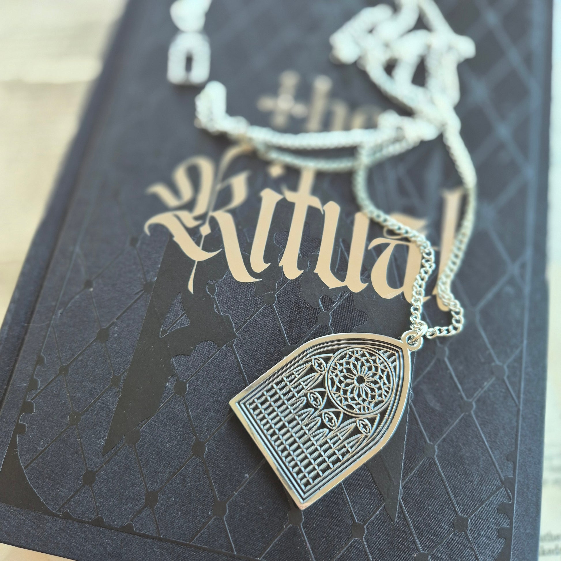 Each order comes with a stainless steel cathedral necklace 🖤✨